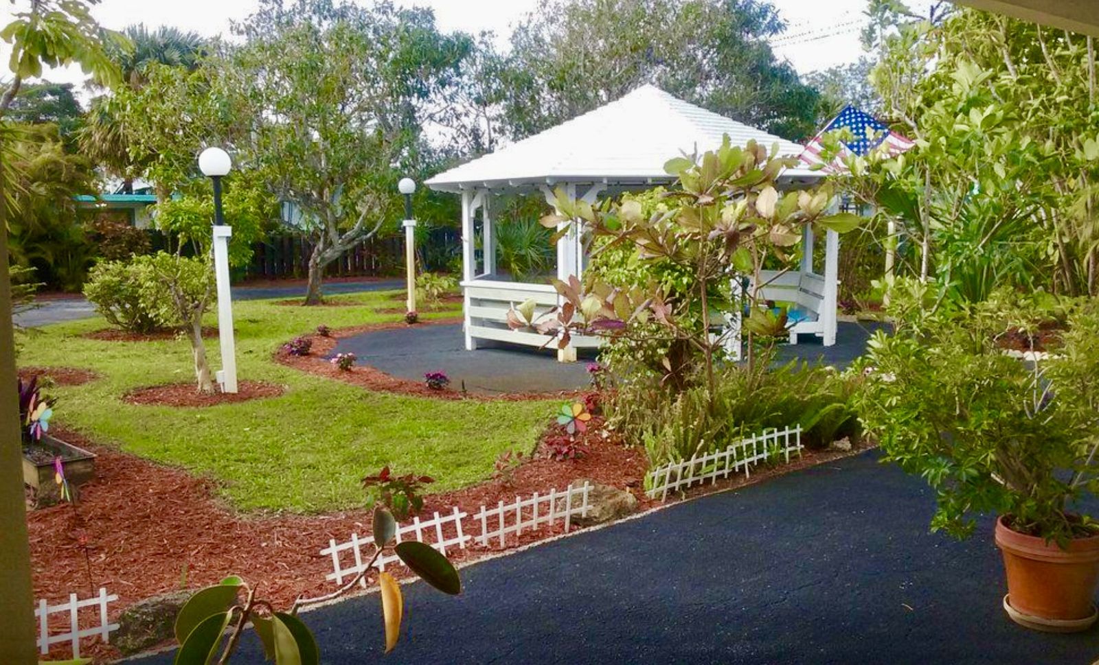 Garden and gazebo the club helps maintain at Rustic Retreat Retirement Home
